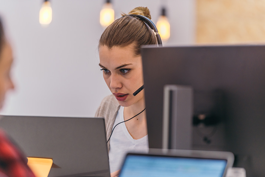 it support help desk technician on a call from our derby support centre